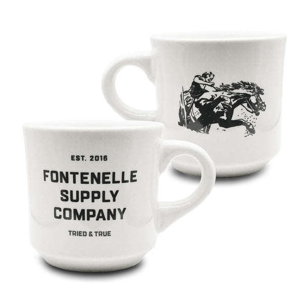 white diner mug with a cowgirl riding a horse fontenelle supply company tried & true