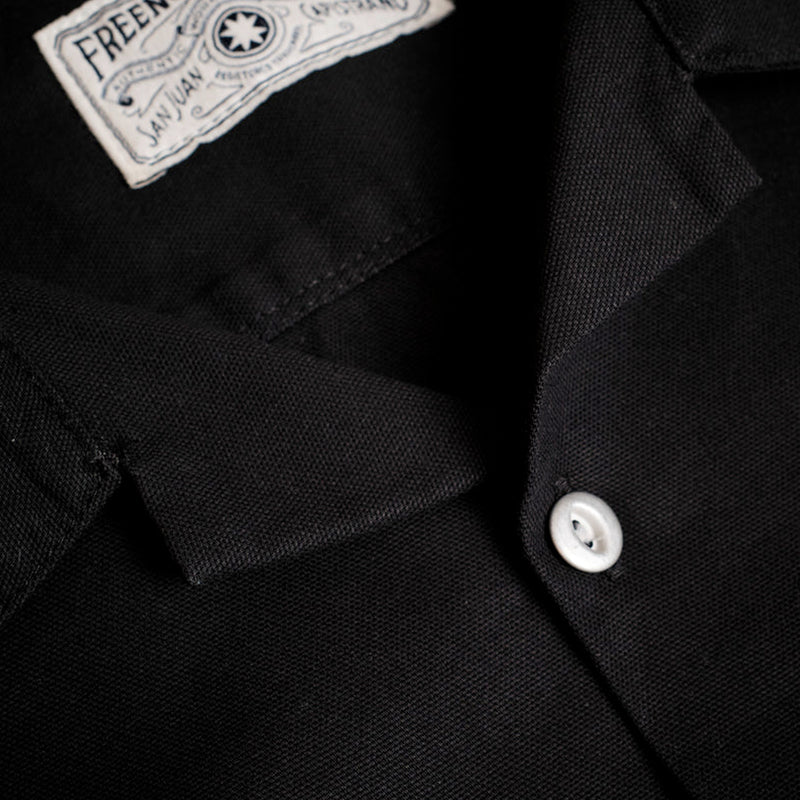 close up collar and tag and button obsidion black short sleeve button up heavy weight dayton